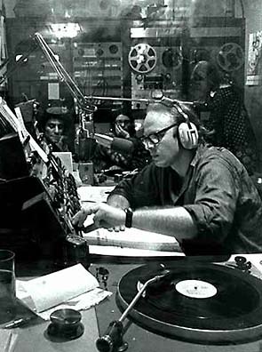B/W Photo Bob Fass of WBAI, NYC and Abbie Hoffman in the radio control room]