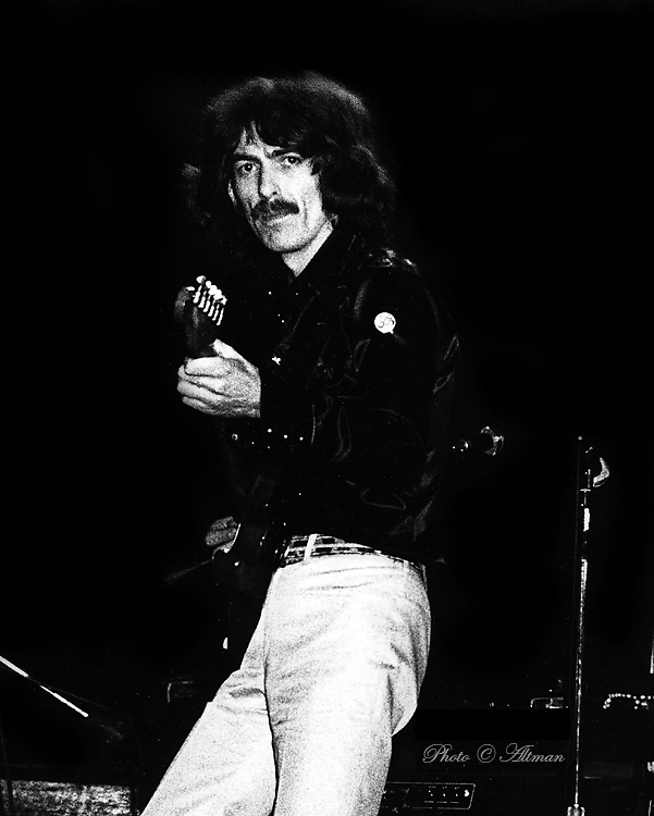 [Photo of George Harrison]