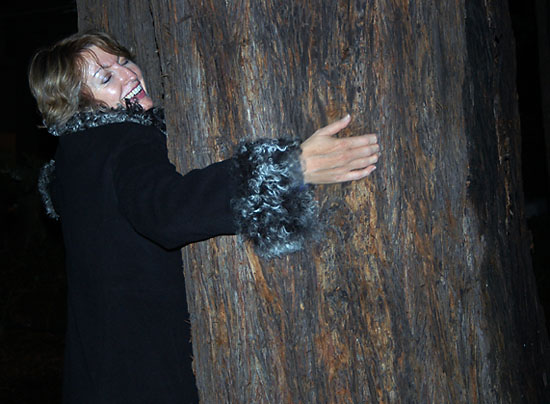 Photo: Barbara Holden Lamble hugging her friend- The Tree