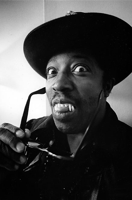 Bo Diddley with funny vampire teeth